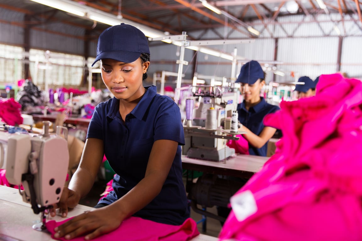 female factory worker sewing